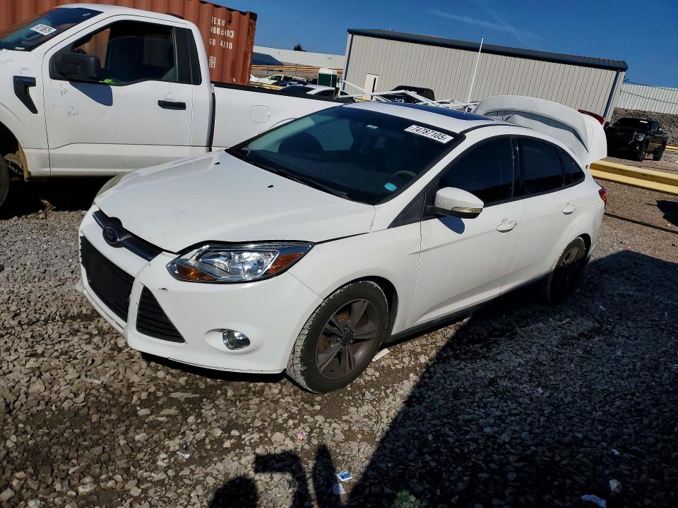 FORD FOCUS 2014 with VIN 1FADP3F2XEL225559 - Photo from auction