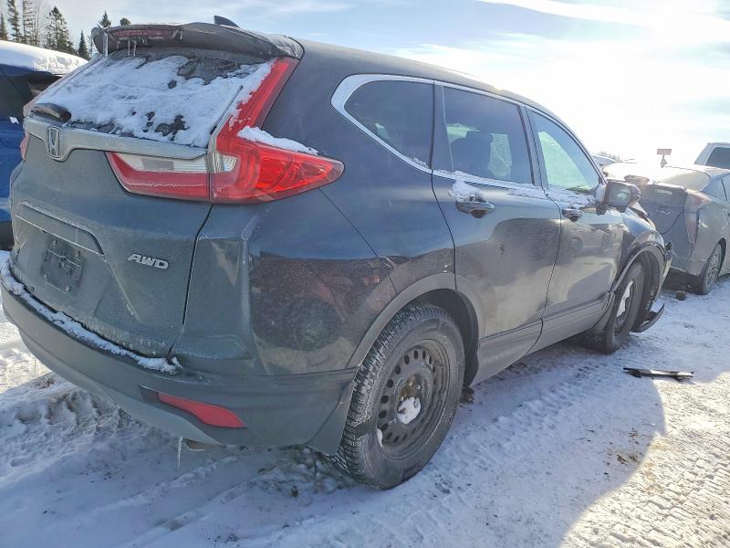 Photo 3 from auction – 2017 HONDA CR-V with VIN 2HKRW2H59HH135638