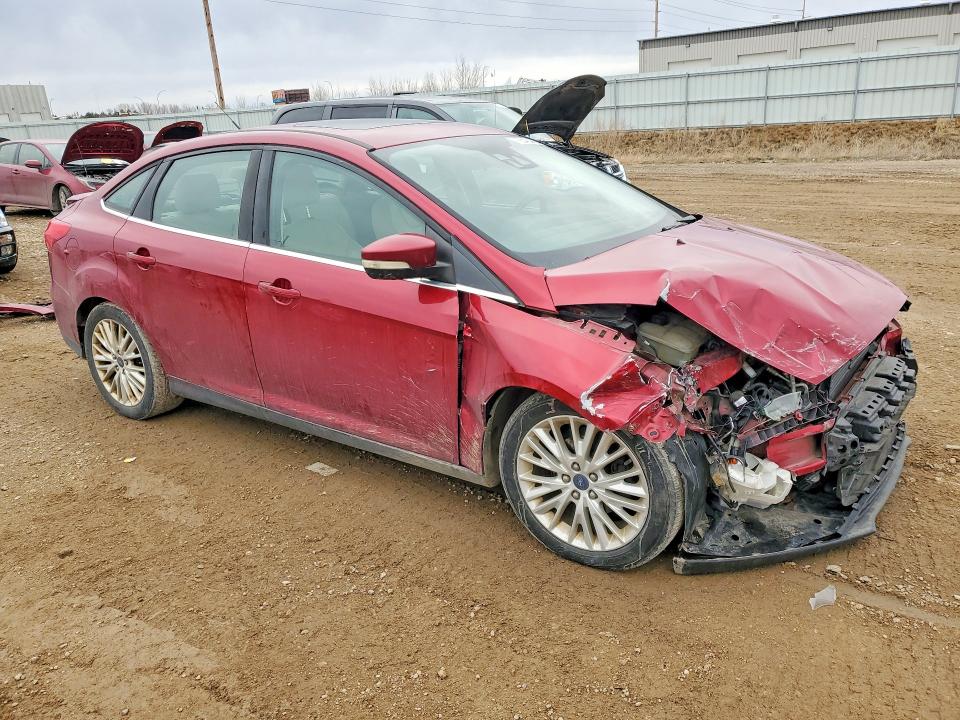 Photo 4 from auction – 2016 FORD FOCUS with VIN 1FADP3J24GL201770
