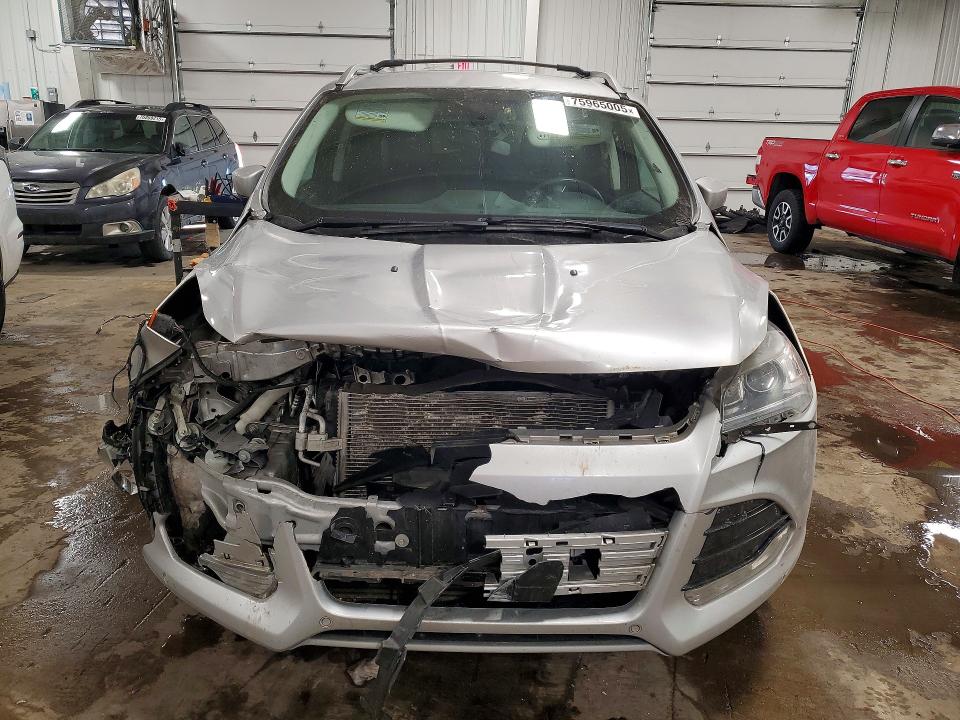 Photo 5 from auction – 2015 FORD ESCAPE TIT with VIN 1FMCU9J98FUB72731