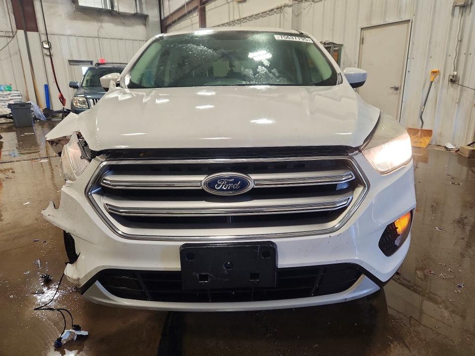 Photo 5 from auction – 2017 FORD ESCAPE with VIN 1FMCU9GD2HUC74640
