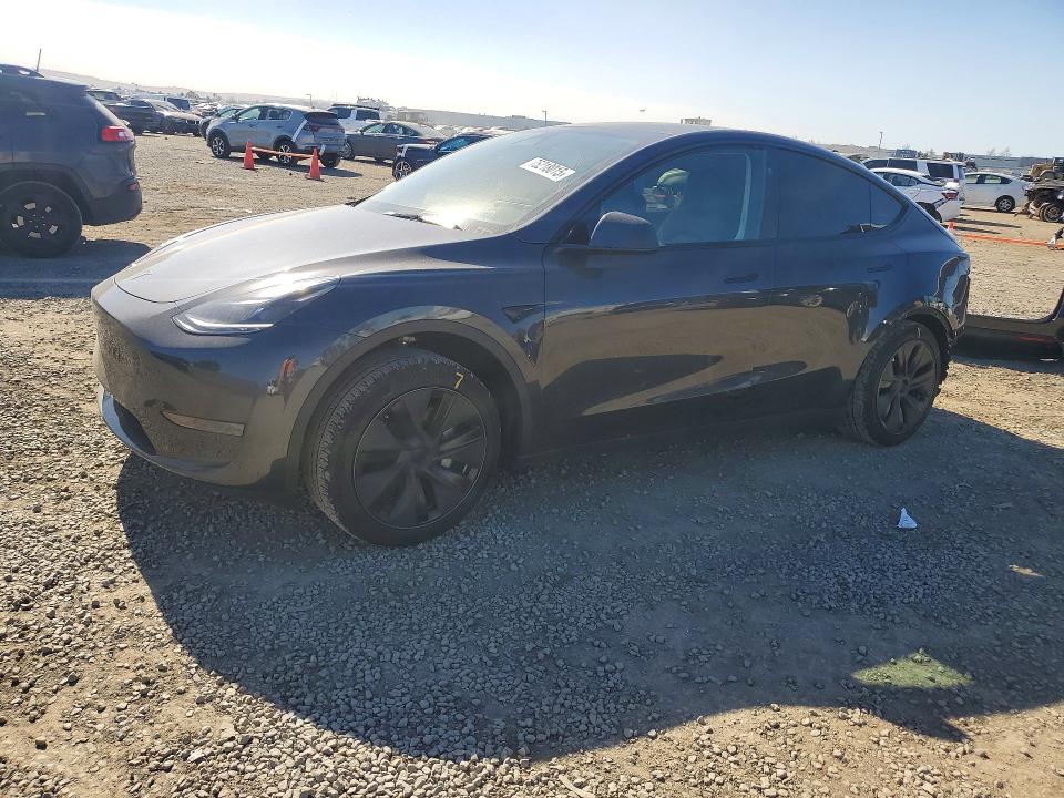 TESLA MODEL Y 2025 with VIN 7SAYGDED1SF317634 - Photo from auction