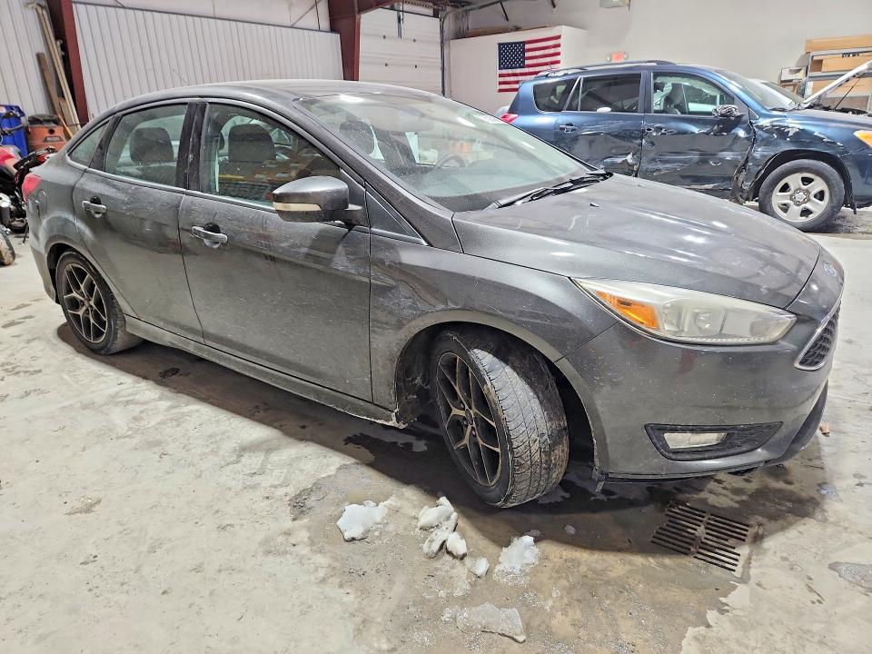 Photo 4 from auction – 2016 FORD FOCUS with VIN 1FADP3F27GL314069