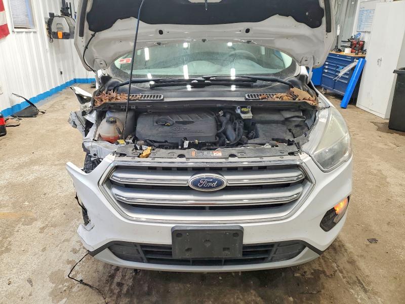 Photo 12 from auction – 2017 FORD ESCAPE with VIN 1FMCU9GD6HUC98701