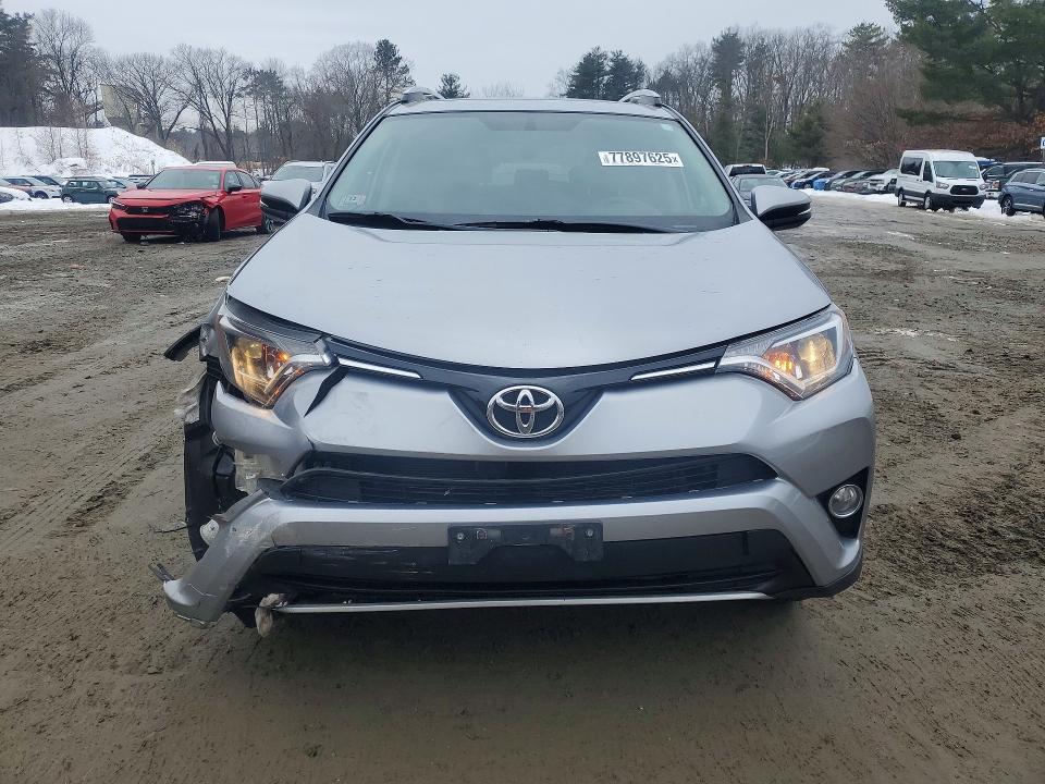 Photo 5 from auction – 2016 TOYOTA RAV4 XLE with VIN 2T3RFREV8GW505322