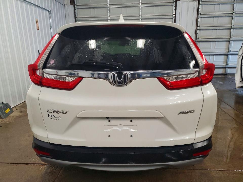 Photo 6 from auction – 2017 HONDA CR-V with VIN 2HKRW2H84HH605228