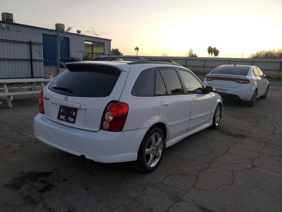 Photo 3 from auction – 2002 MAZDA PROTEGE PR with VIN JM1BJ246721516787
