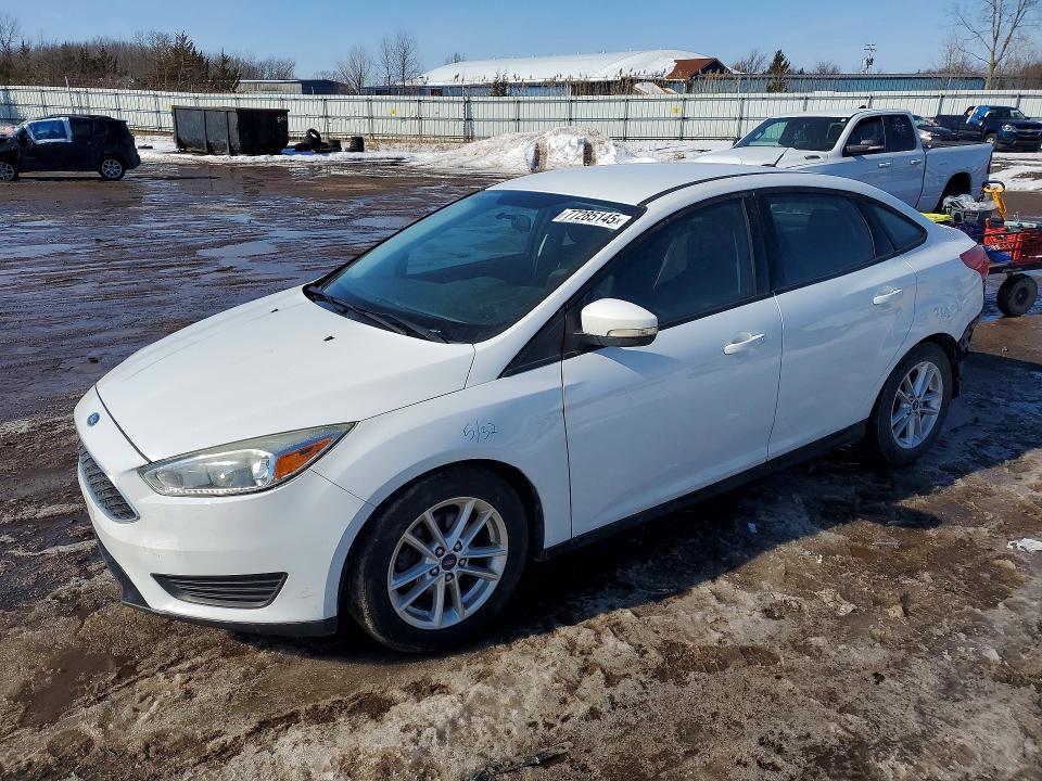 FORD FOCUS 2016 with VIN 1FADP3F23GL358697 - Photo from auction