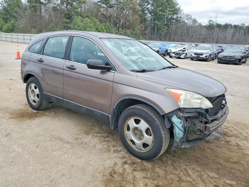 Photo 4 from auction – 2011 HONDA CR-V with VIN 5J6RE3H3XBL015531