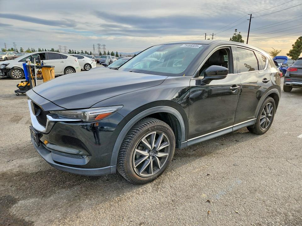 MAZDA CX-5 2018 with VIN JM3KFADM9J0349693 - Photo from auction