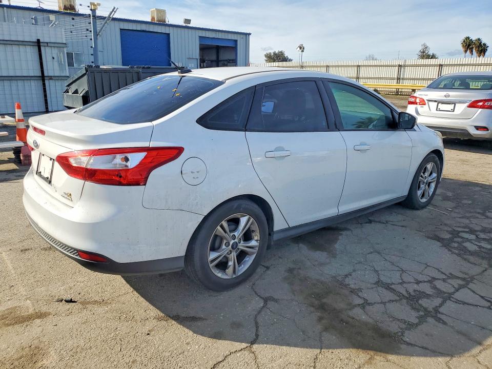 Photo 3 from auction – 2013 FORD FOCUS with VIN 1FADP3F21DL325953