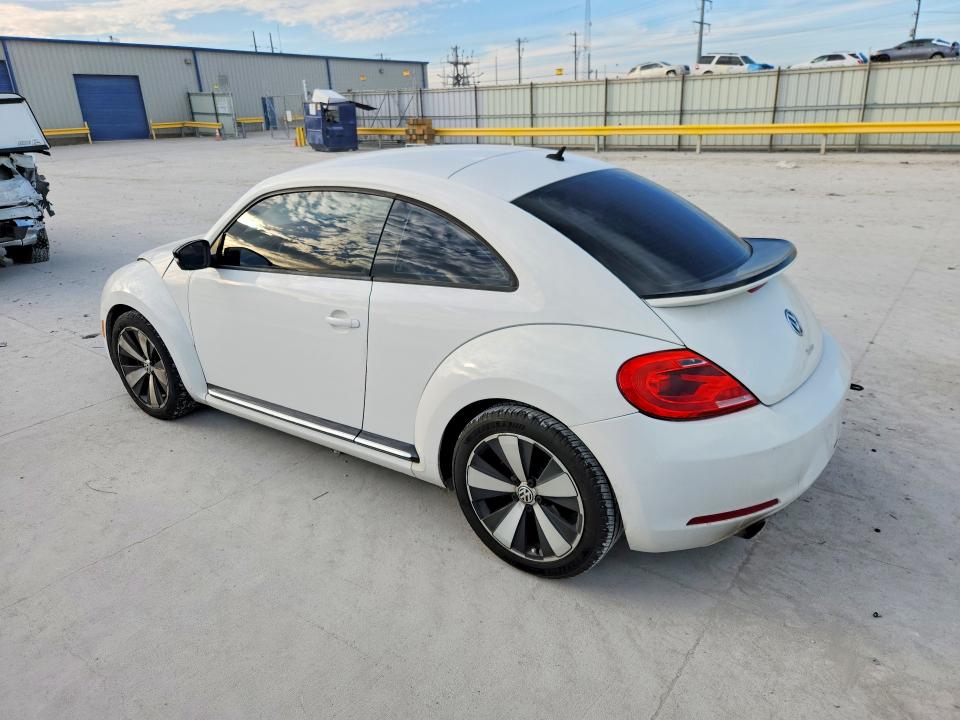 Photo 2 from auction – 2012 VOLKSWAGEN BEETLE TUR with VIN 3VWVA7AT6CM621648