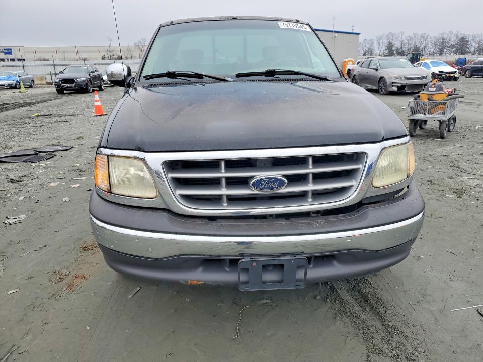 Photo 5 from auction – 2002 FORD F150 with VIN 1FTRX17W32NA13561