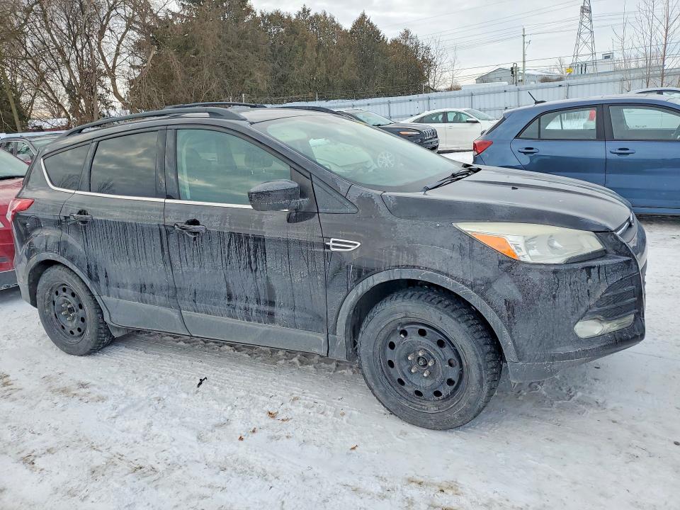 Photo 4 from auction – 2013 FORD ESCAPE with VIN 1FMCU0G91DUC49536