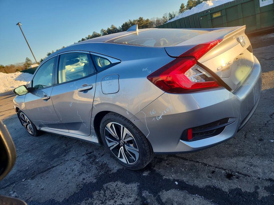 Photo 2 from auction – 2018 HONDA CIVIC EX with VIN JHMFC1F85JX043857