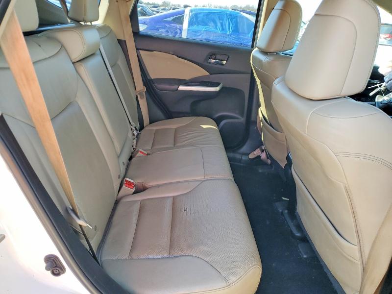 Photo 11 from auction – 2015 HONDA CR-V with VIN 5J6RM4H7XFL001288