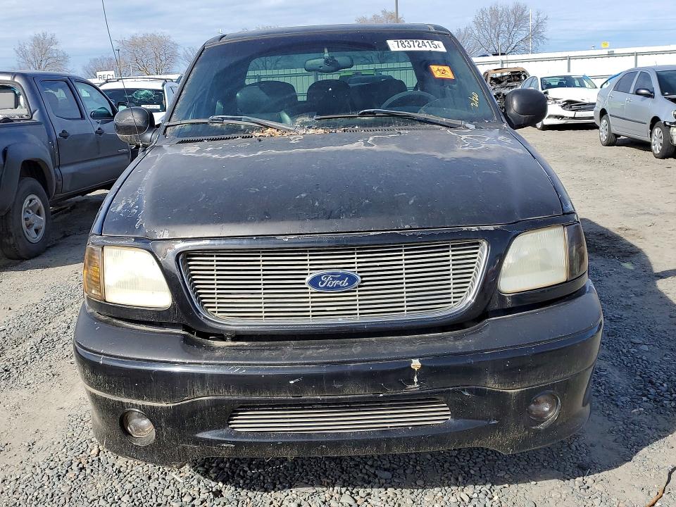 Photo 5 from auction – 2001 FORD F150 with VIN 1FTRW07L01KA92058