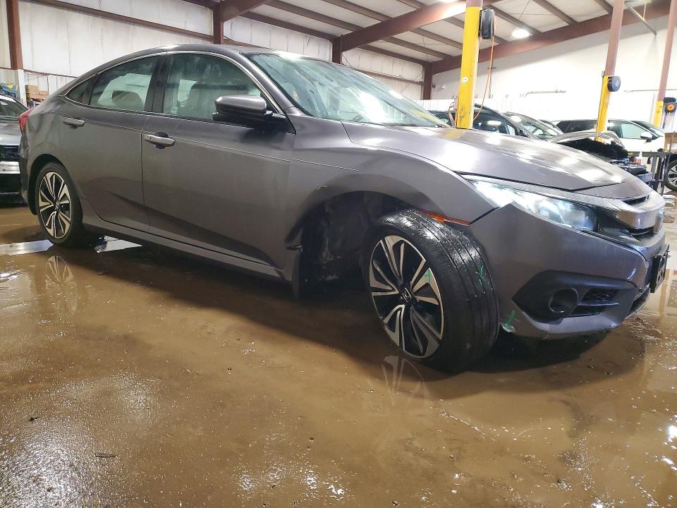 Photo 4 from auction – 2016 HONDA CIVIC with VIN 2HGFC1F30GH646994