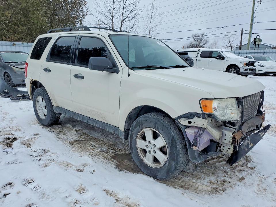 Photo 4 from auction – 2011 FORD ESCAPE with VIN 1FMCU0D75BKA77619
