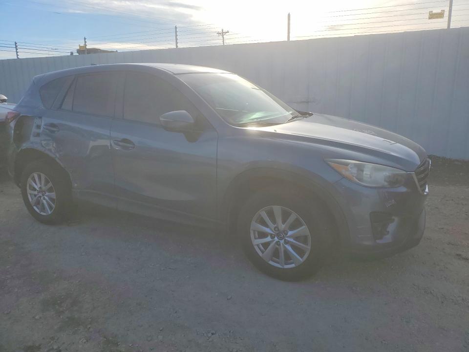 Photo 4 from auction – 2016 MAZDA CX-5 with VIN JM3KE2CY6G0799548