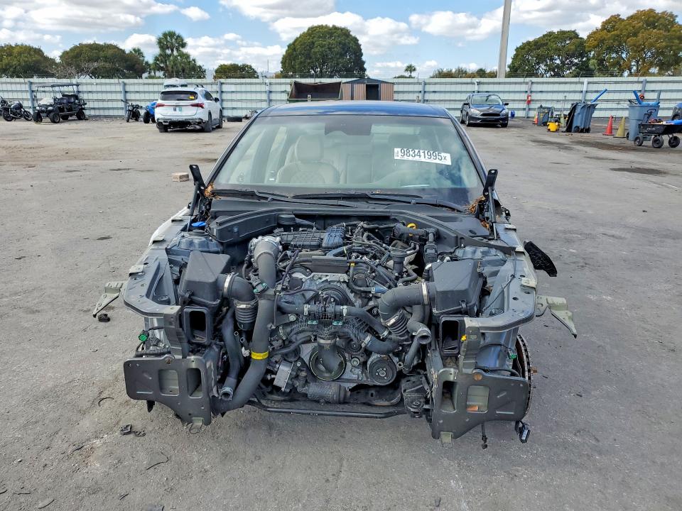 Photo 5 from auction – 2023 GENESIS G70 with VIN KMTG54TE0PU127172