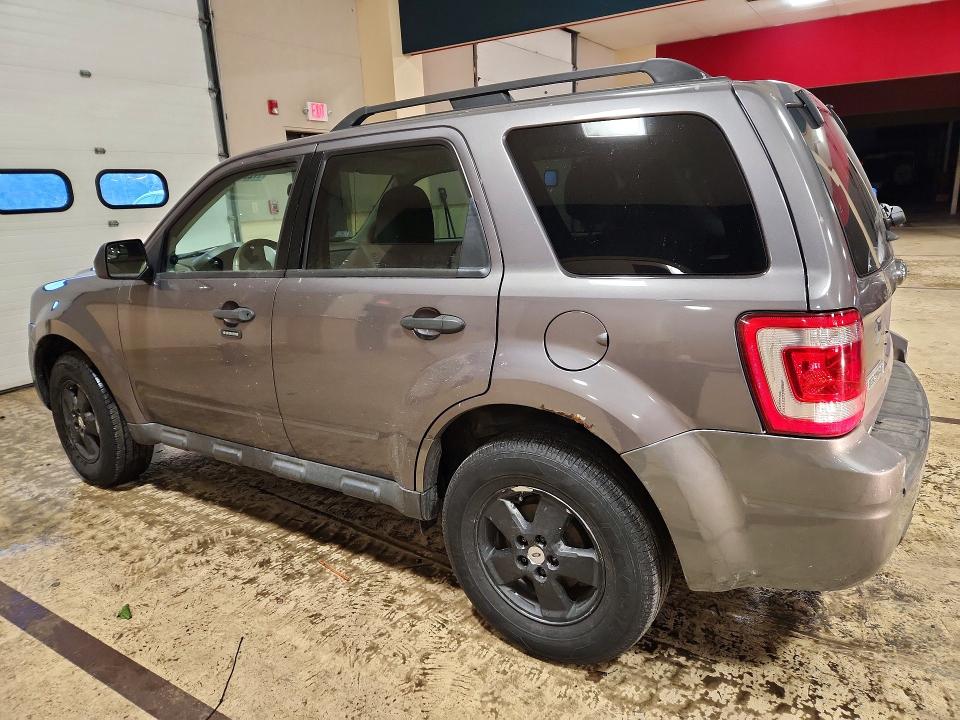 Photo 2 from auction – 2011 FORD ESCAPE with VIN 1FMCU9D71BKB35911