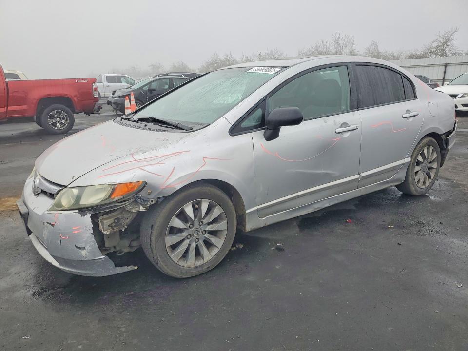 HONDA CIVIC EX 2009 with VIN 19XFA16869E020929 - Photo from auction