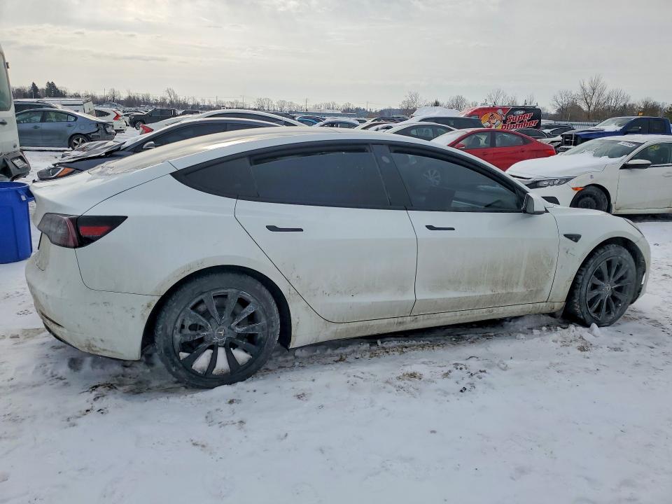 Photo 3 from auction – 2022 TESLA MODEL 3 with VIN 5YJ3E1EA7NF374099