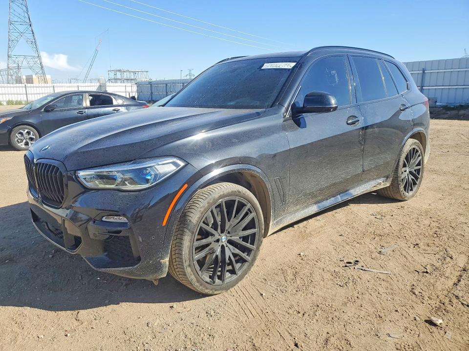BMW X5 2021 with VIN 5UXJU4C03M9E57092 - Photo from auction