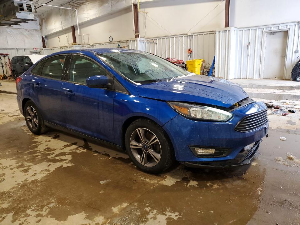 Photo 4 from auction – 2018 FORD FOCUS SE with VIN 1FADP3FE3JL270377