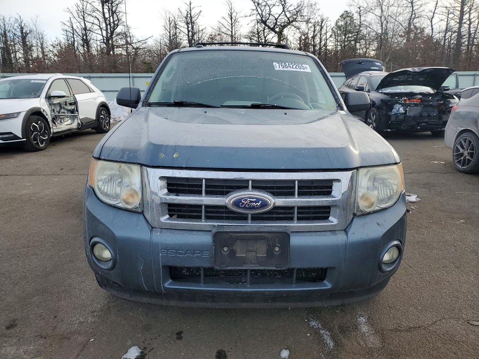 Photo 5 from auction – 2011 FORD ESCAPE with VIN 1FMCU0D77AKC64116
