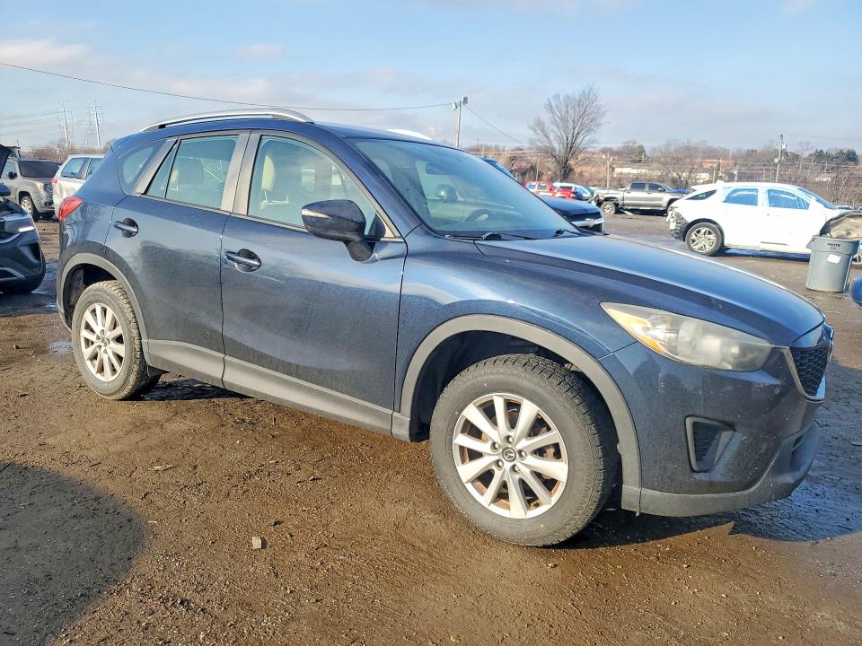 Photo 4 from auction – 2015 MAZDA CX-5 with VIN JM3KE2BE9F0522365