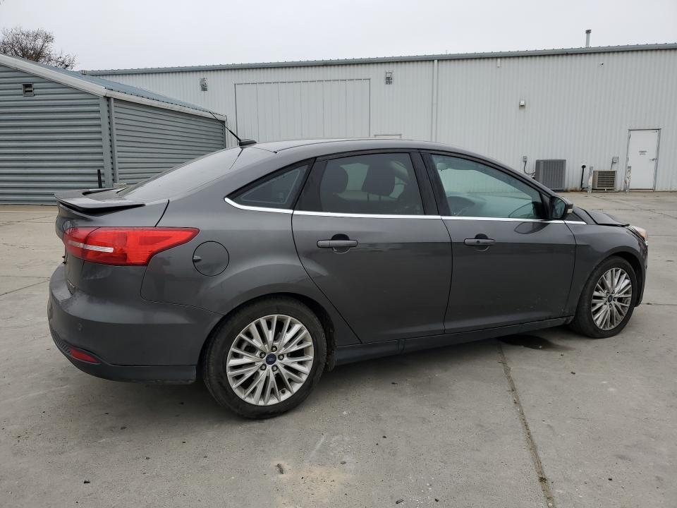 Photo 3 from auction – 2016 FORD FOCUS with VIN 1FADP3J20GL298112