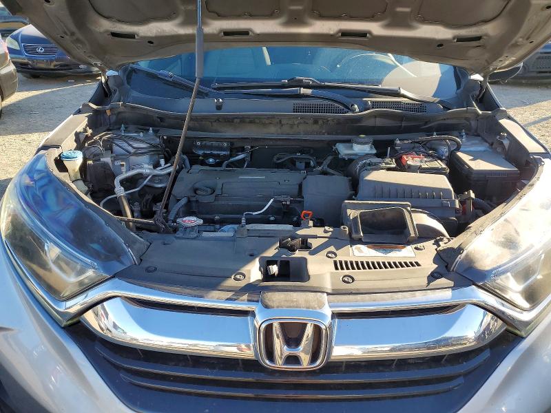 Photo 12 from auction – 2017 HONDA CR-V LX with VIN 7FARW5H34HE011117