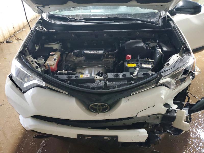 Photo 11 from auction – 2018 TOYOTA RAV4 LE with VIN JTMBFREV1JJ718927