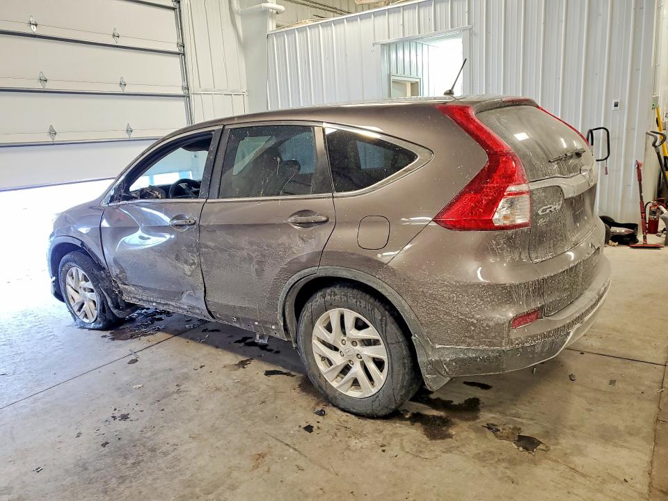 Photo 2 from auction – 2016 HONDA CR-V with VIN 2HKRM3H57GH565906
