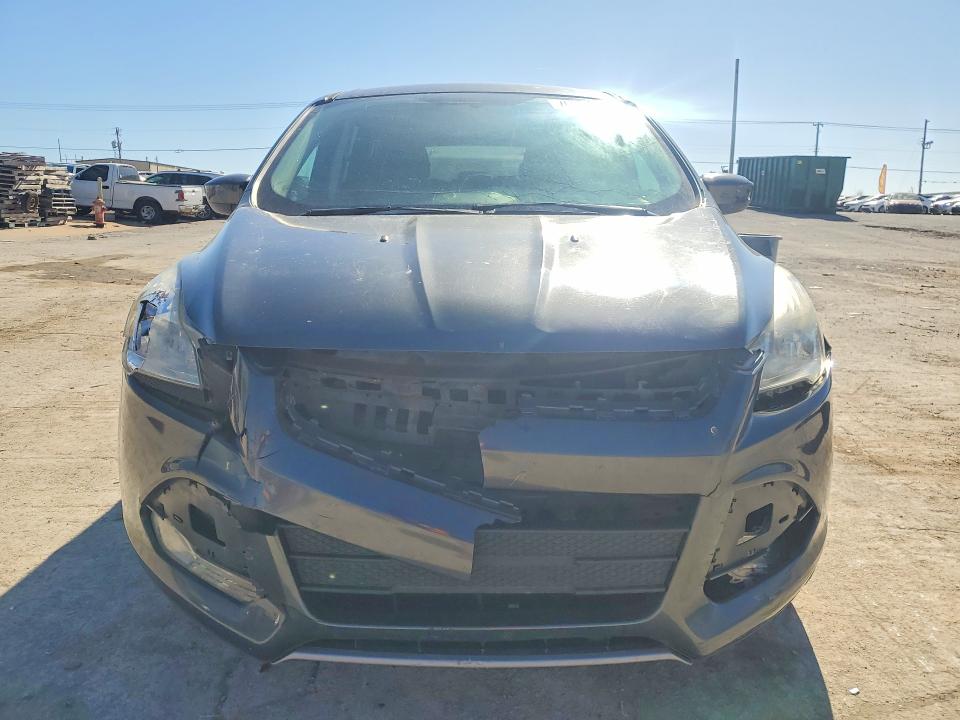Photo 5 from auction – 2016 FORD ESCAPE with VIN 1FMCU0G99GUB60429