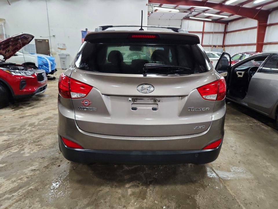 Photo 6 from auction – 2012 HYUNDAI TUCSON GLS with VIN KM8JUCAC0CU351406