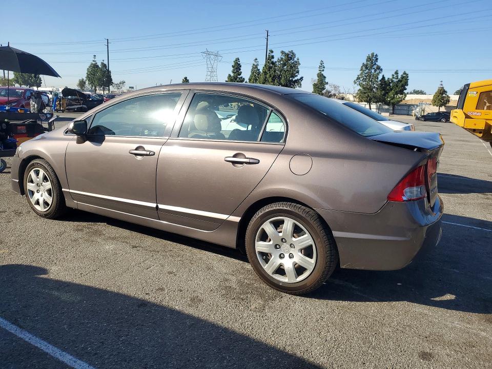 Photo 2 from auction – 2011 HONDA CIVIC LX with VIN 2HGFA1F58BH517014