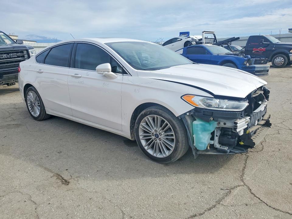 Photo 4 from auction – 2014 FORD FUSION with VIN 3FA6P0HDXER256687