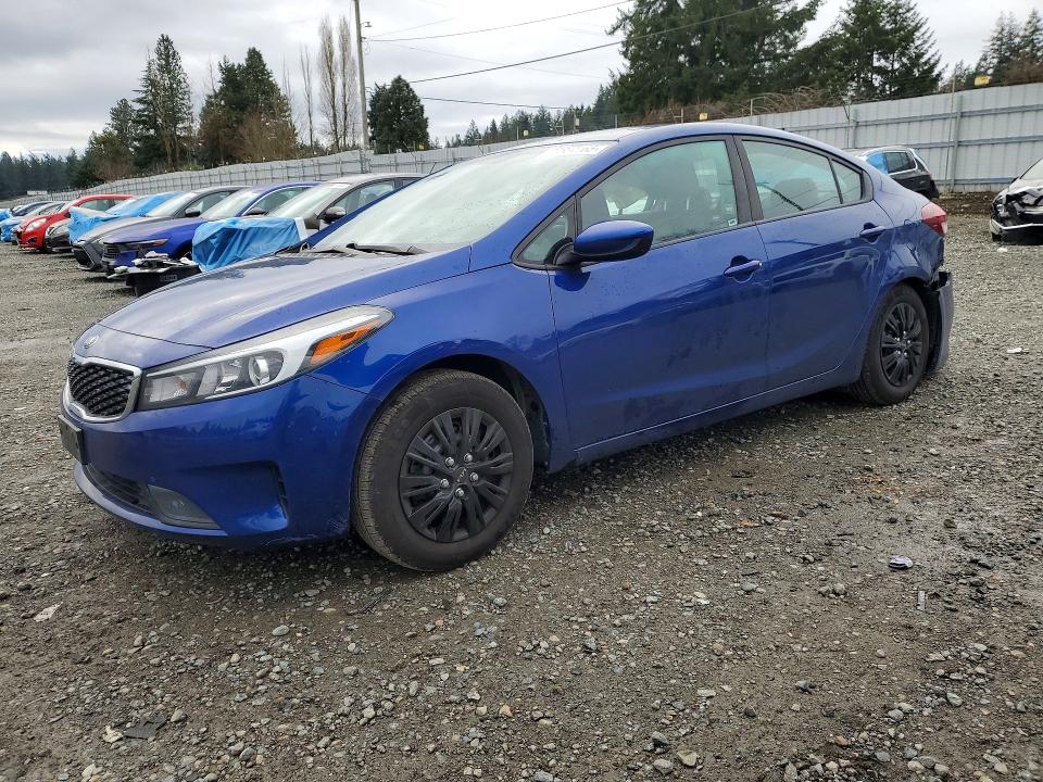 KIA FORTE 2017 with VIN 3KPFL4A75HE135028 - Photo from auction