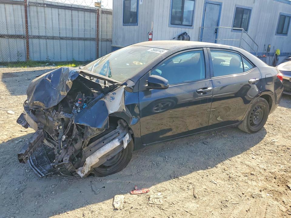 TOYOTA COROLLA 2017 with VIN 5YFBURHE4HP701515 - Photo from auction