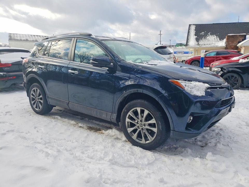 Photo 4 from auction – 2018 TOYOTA RAV4 with VIN 2T3DFREV1JW731753