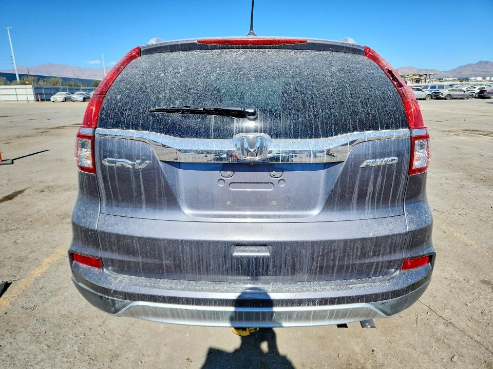 Photo 6 from auction – 2016 HONDA CR-V EXL with VIN 2HKRM4H77GH679203