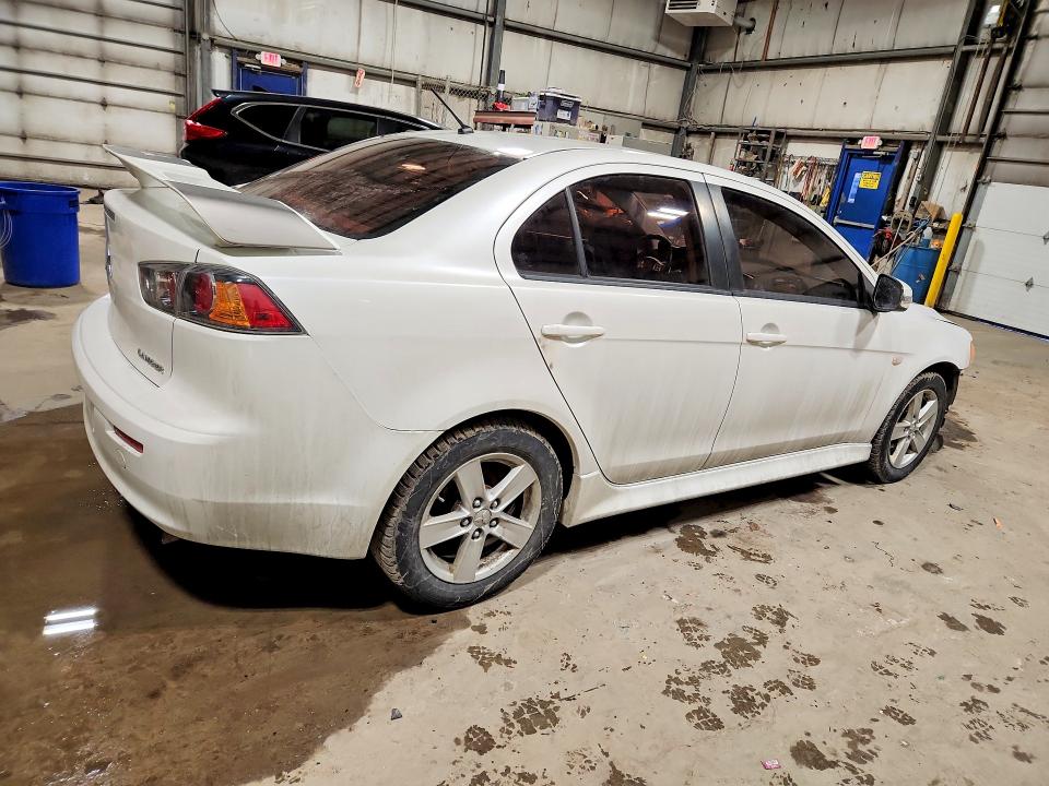 Photo 3 from auction – 2016 MITSUBISHI LANCER with VIN JA32U2FU4GU604428