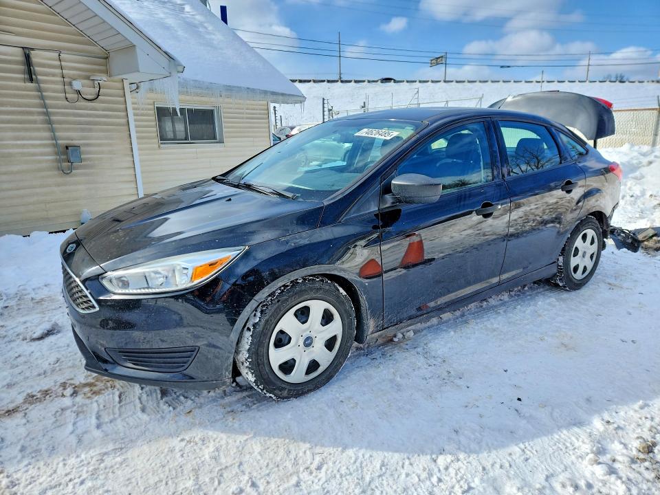 FORD FOCUS S 2015 with VIN 1FADP3E2XFL328158 - Photo from auction