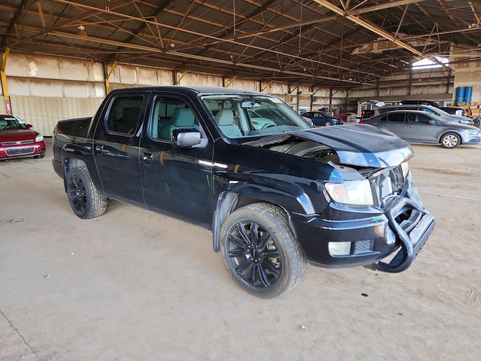 Photo 4 from auction – 2013 HONDA RIDGELINE with VIN 5FPYK1F4XDB008280
