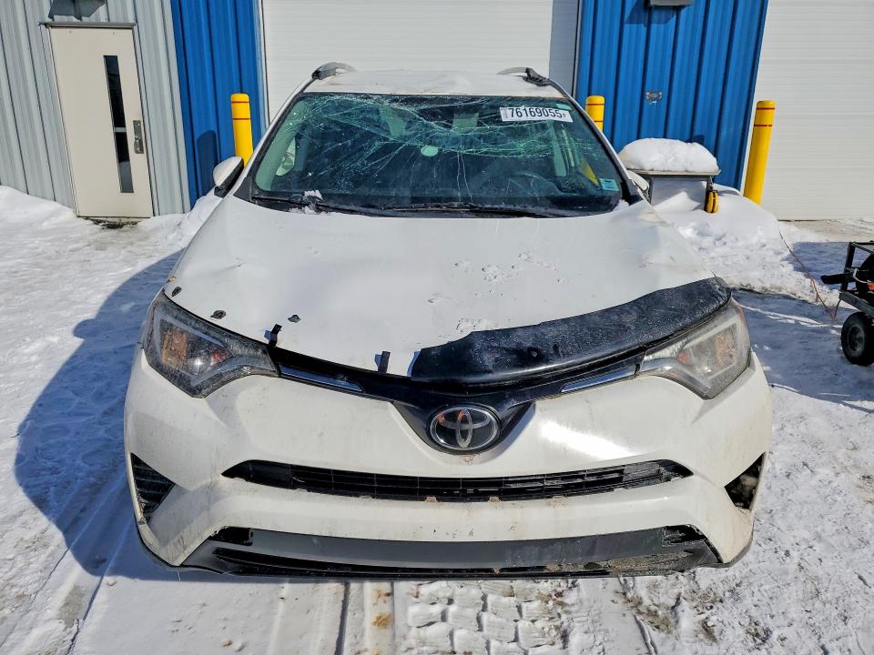 Photo 5 from auction – 2018 TOYOTA RAV4 LE with VIN 2T3BFREV6JW768241