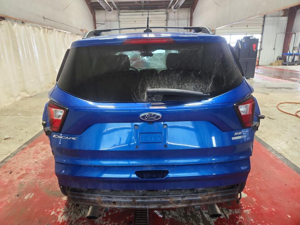 Photo 6 from auction – 2019 FORD ESCAPE with VIN 1FMCU9GD1KUB23179