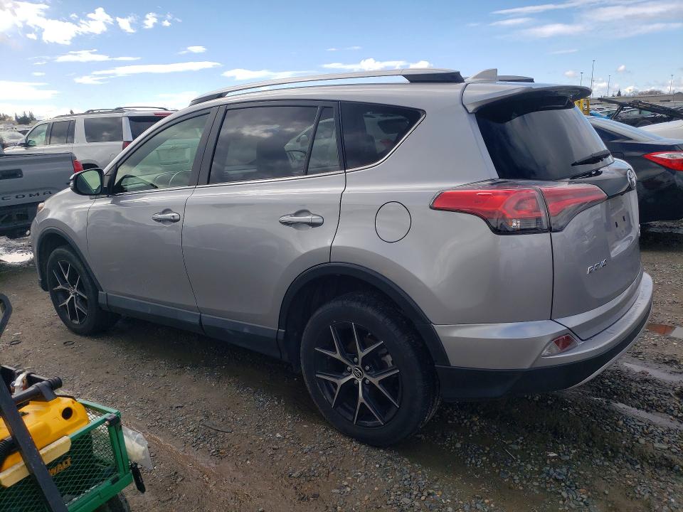 Photo 2 from auction – 2018 TOYOTA RAV4 with VIN JTMJFREV6JD239915